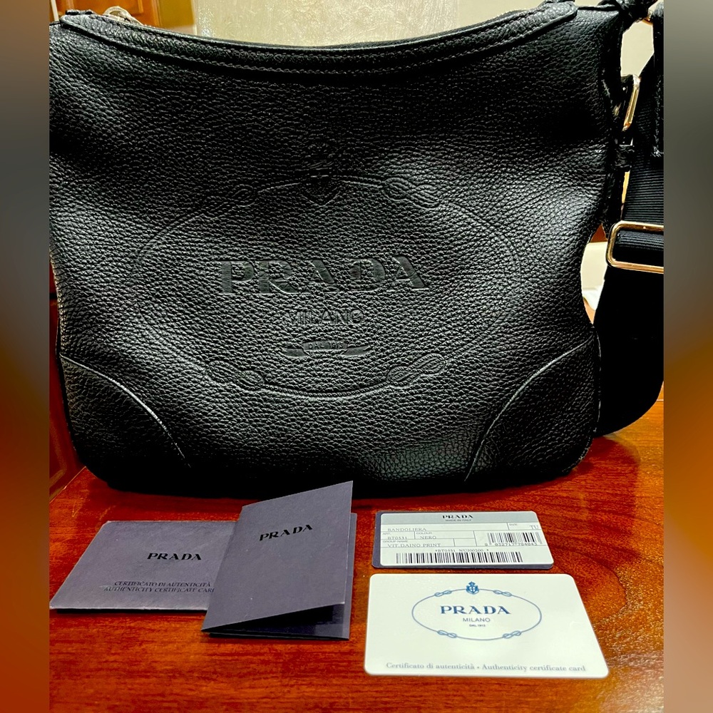 Gorgeous, authentic like new PRADA Bandoliera rich black pebbled leather purse.